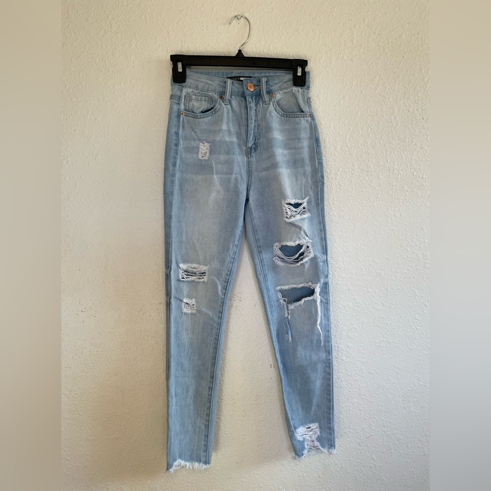 Petite high rises ripped blue jeans Size 0